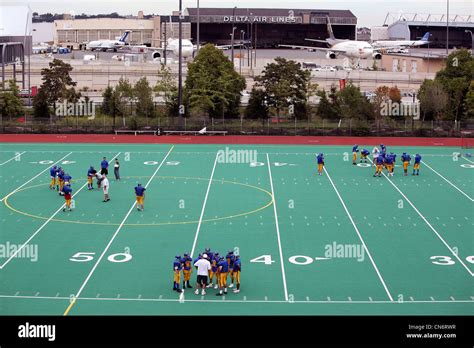 American High School Football Field On The Edge Of Logan Airport In