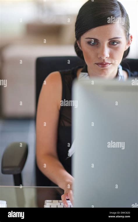 Young Office Worker Using Computer Stock Photo Alamy