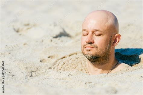 Male Bald Head Above Sand Man Buried Alive In Desert Punished Boy
