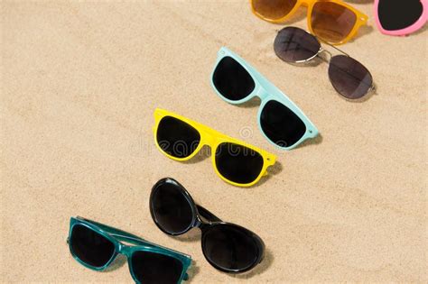 Different Sunglasses On Beach Sand Stock Image Image Of Sunglasses