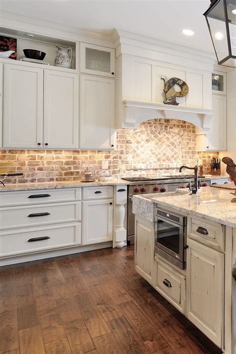 Whitewashed Brick Backsplash Dark Plank Floor Wintage Look Cabinets