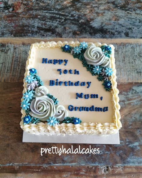 Square Buttercream Cake With Blue Flowers