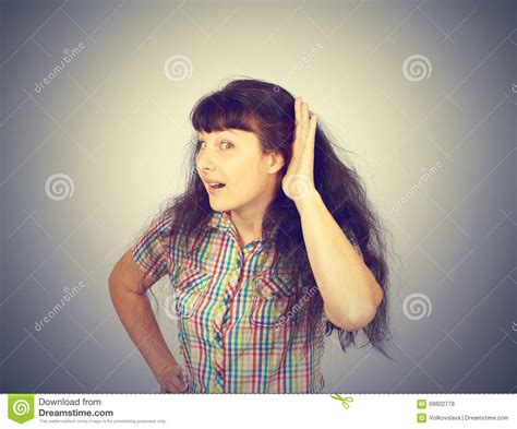 Gossip Girl Eavesdropping With Hand To Ear Stock Photo Image Of