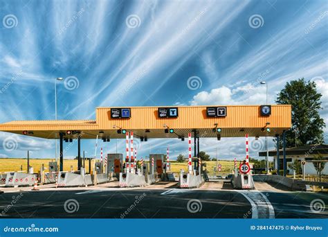 Cars Passing Through The Automatic Point Of Payment On A Toll Road