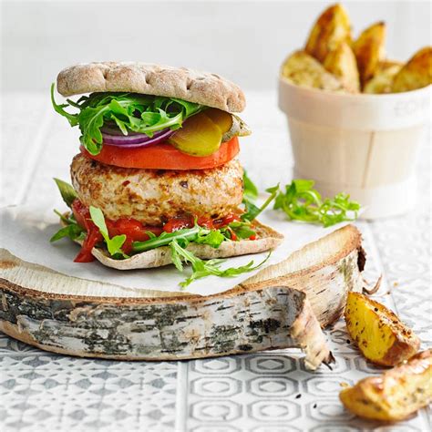 Juicy and flavorful healthy turkey burgers with 5 simple ingredients. Spicy turkey burger with rosemary & garlic wedges ...