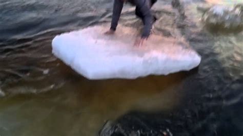 Guy Slips Off Ice And Into Water Youtube