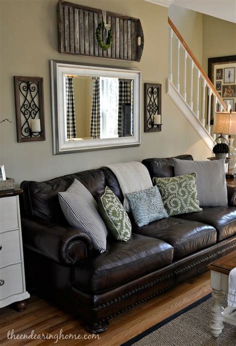 Adding A Mirror Above The Sofa Is A Great Way To Create The Sense Of