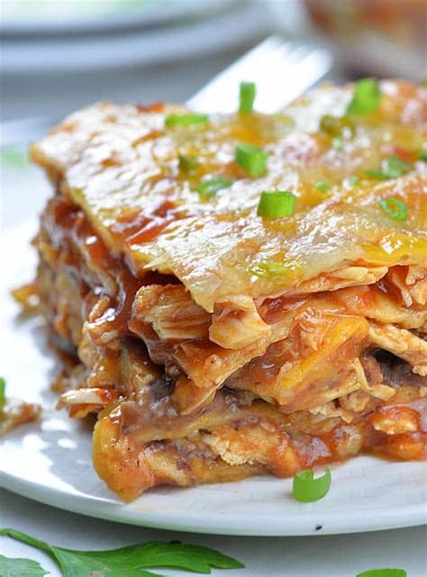 Repeat these layers once more and bake, covered, for 40 minutes. Cheesy Chicken Enchilada Casserole | Easy Chicken Casserole