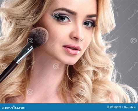 Beauty Portrait Of Blonde Beautiful Woman With Perfect Makeup And Hair