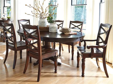 Formal cherry dining room set table chairs, china cabinet, sideboard, leaf pads. Ashley Furniture Porter D697-50B+50T+2x01A+4x01 7-Piece Round Dining Table Set | Lapeer ...