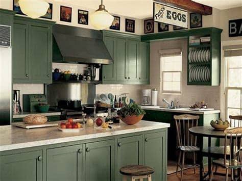 Putting green color with glossy effect on the center working table and chromatic or stainless steel table top is a good design idea. Green Kitchen Cabinets for Eco Friendly Homeowners ...