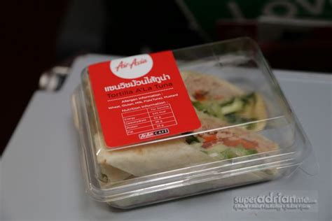 Check air asia's website to see if they have updated their inflight meals policy since then. AirAsia In-flight Menu - Delicious Treats Onboard