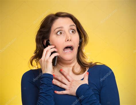 Woman Receiving Shocking News On A Phone — Stock Photo © Siphotography