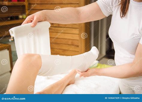anti cellulite wraps procedure for legs in a spa center stock image image of beautiful health