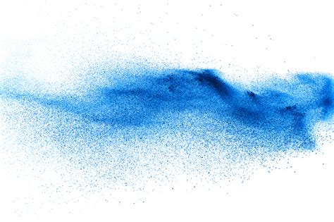 Blue Color Dust Particles Splash On White Background Stock Photo