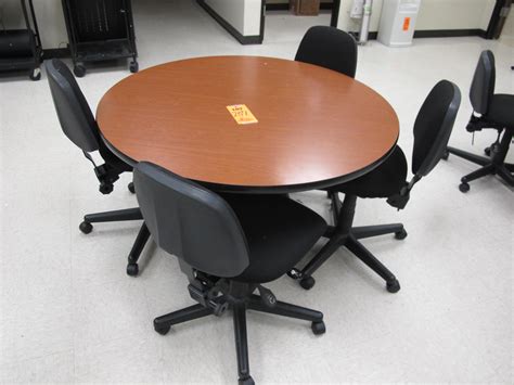 Steve silver company tournament captains chair with casters, brown. Round Dining Table with 4 Adjustable Rolling Chairs