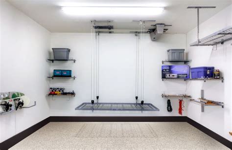 A Motorized Garage Storage Lift Installation And Garage Shelving