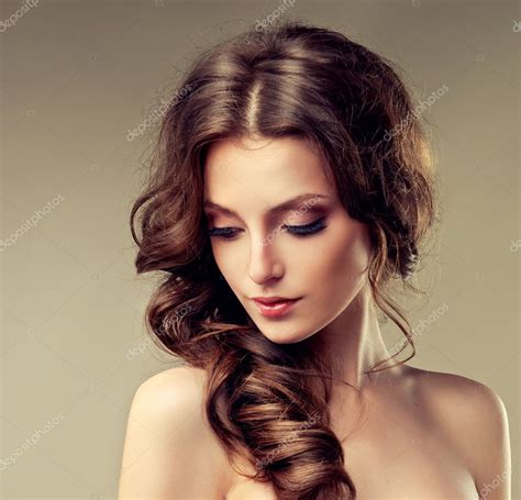 Beautiful Brunette Woman With Curly Hair Stock Photo By ©edwardderule