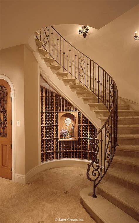 The Curved Main Staircase Shelters The Wine Cellar Below Luxurious
