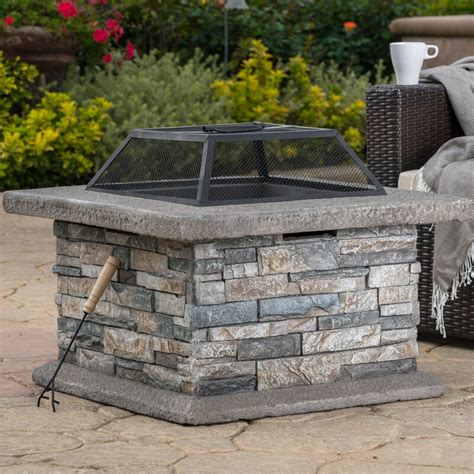 17 Stories Coonrod Faux Stone Wood Burning Fire Pit Table