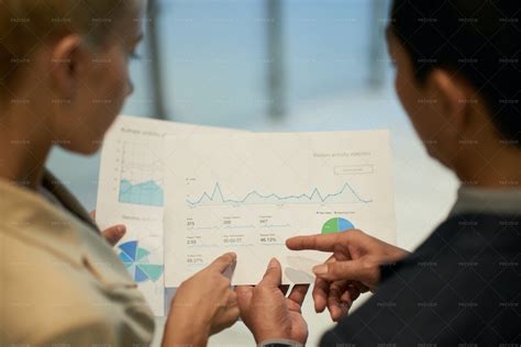 Business People Analyzing Data - Stock Photos | Motion Array
