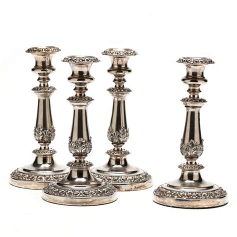 A Set Of Four Antique Sheffield Plate Candlesticks Lot 1016 The