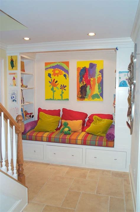 The seat in the reading corner was made so he could have a snugly corner. Creative Kids Spaces: From Hiding Spots to Bedroom Nooks