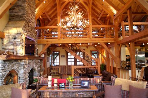This rustic cottage house plan greets you with a wraparound porch supported by matching pairs of columns on stone pedestals and a bay window. Rustic House Plans | Our 10 Most Popular Rustic Home Plans