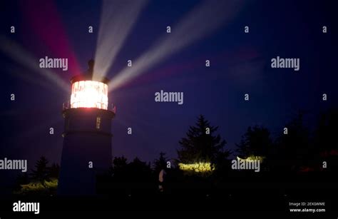 Umpqua Lighthouse Beams Light Through Rain Fog Stock Photo Alamy
