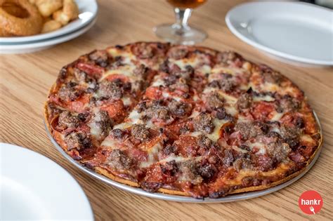 Best dining in fort atkinson, wisconsin: Meat Lover's Pizza - $16 - Sunset Bar & Grill - Fort ...