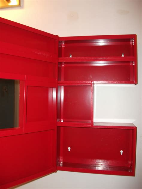 Morgon wall cabinet with 1 door highgloss white 40x32x58 cm. Moving out of Timmins sale: Red IKEA medicine Cabinet