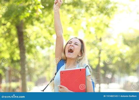 Excited Student Is Celebrating Success In A Park Stock Image Image Of