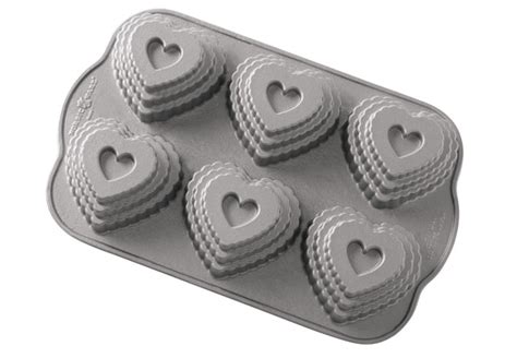 Nordic ware heritage bundt® pan. Giftable: The Tiered Heart Cakelet Pan from Nordic Ware ...
