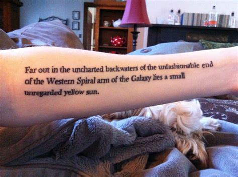 The hitchhiker's guide to the galaxy. My first tattoo; first line of The Hitchhiker's Guide to the Galaxy. By Chelsea Louviere ...