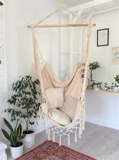 New season, new arrivals · free design services · room inspirations Hammock chair boho hammock. Rocking-chair of beige color ...