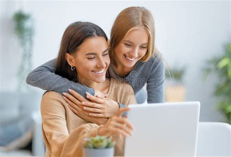 Two Happy Young Women Using Laptop Stock Image Image Of Adult Girl