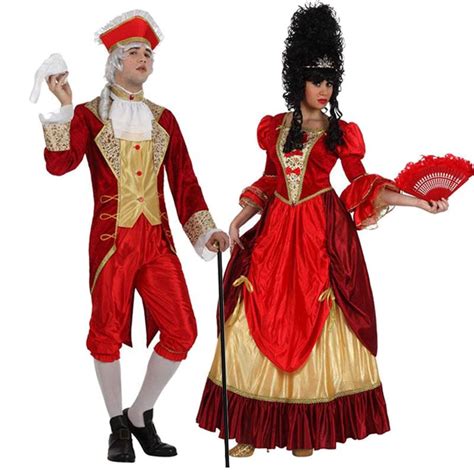 Two People Dressed In Costume Standing Next To Each Other