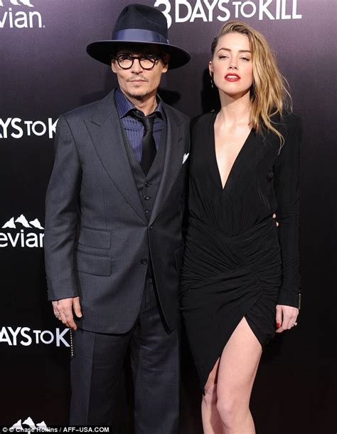Johnny Depp And Amber Heard Enjoy Rare Pda At 3 Days To Kill Premiere