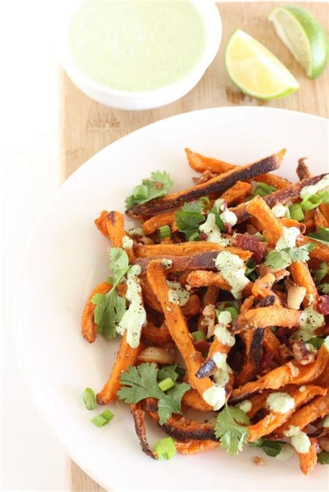 Sweet potatoes are high in vitamin a baking them caramelizes the outside and leaves the inside creamy and tender. SWEET POTATO FRIES WITH BACON AND CILANTRO LIME SAUCE RECIPE | Best Friends For Frosting ...