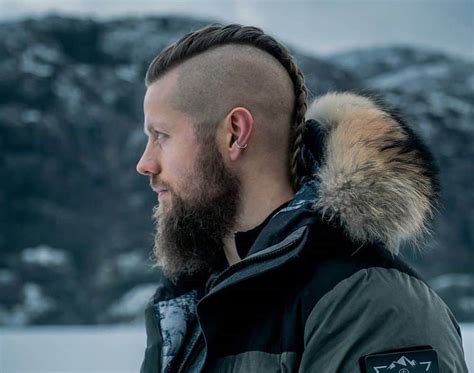 This hairstyle can be best described as a blend of short and long hair, shaved and thick or long hair, or each the above. 20 Retro-chic Viking Hairstyles for Men - Hairstyle Camp