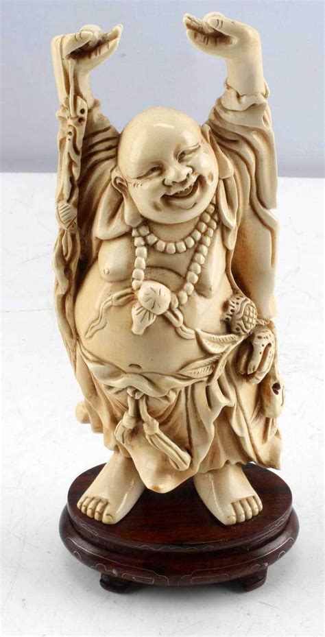 Lot - ANTIQUE IVORY BUDDHA LAUGHING RAISED HANDS