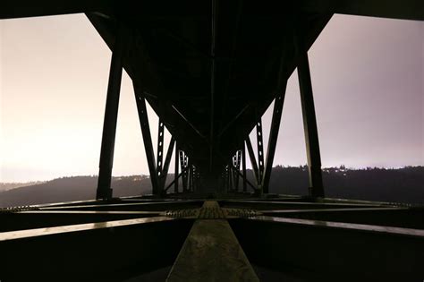 Photo Of Underneath Metal Bridge