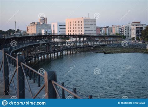 Rio Tinto Pier Surrounded By Buildings Under The Sunlight At Daytime In