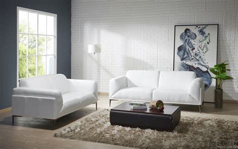 A minimalist living room with a heavenly piece of warmth and comfort; Minimalist White Leather Sofa - Sofa - Living Room - Buy ...