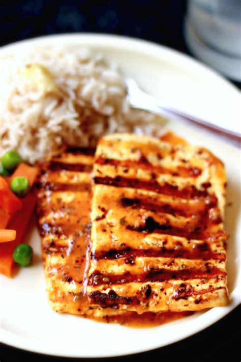 This dish serves paneer cheese with spicy and rich gravy. Under 30 Minute Grilled Peri Peri Paneer Steaks with Nando's Lemon and Herb Sauce | Recipe ...