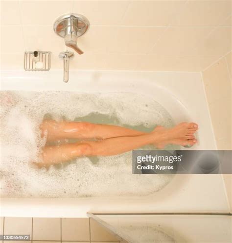 woman leg bath photos and premium high res pictures getty images