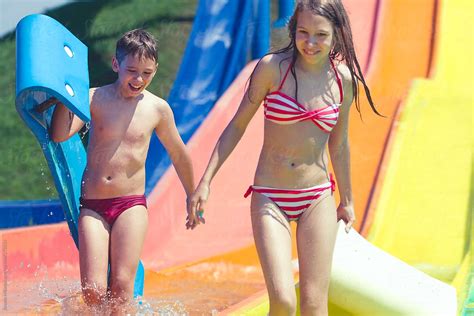 Babe And Girl In Bikini Having Fun In Water Park By Jovana Milanko