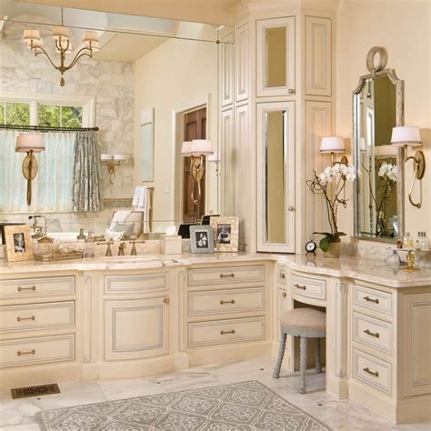 Lavatories and the sculptural tub in pristine white provide a sharp contrast in the color palette. dallas corner vanity cabinet with double sink bathroom ...