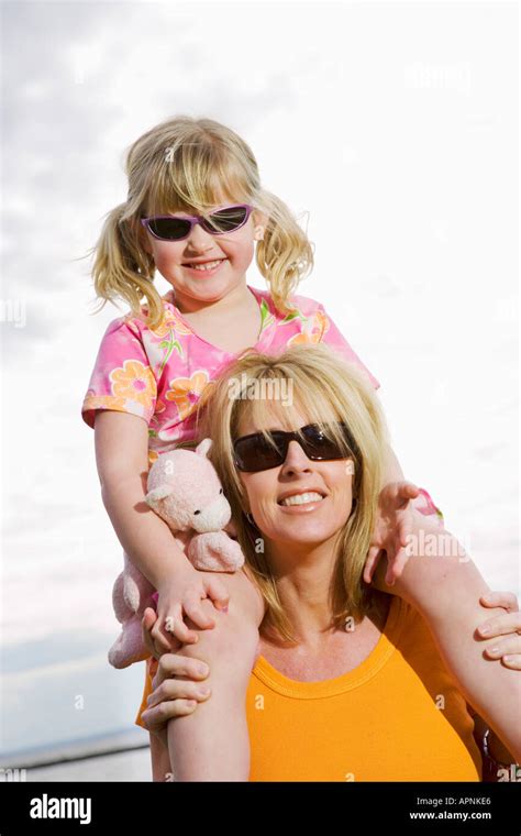 Child On Moms Shoulders Hi Res Stock Photography And Images Alamy
