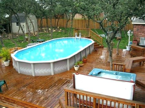 Build a small square above ground pool with deck ideas to elevate your house. 50 Best Above Ground Pools with Decks